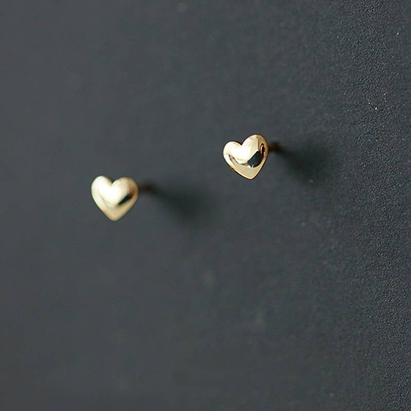 Gold tiny heart studs