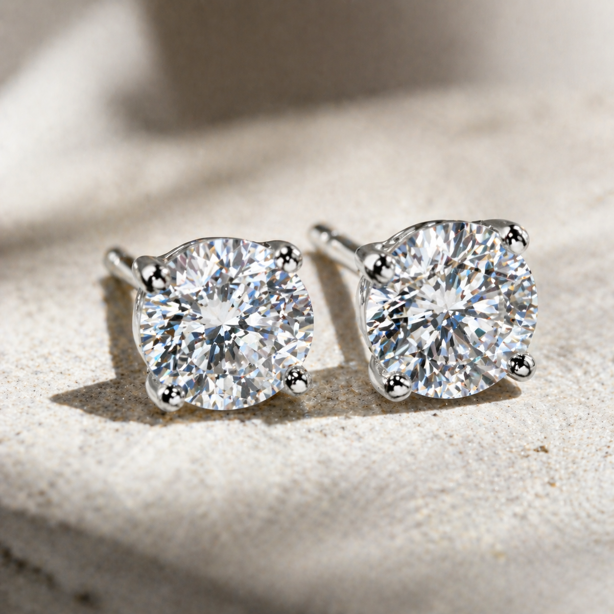 An Instant Classic Four-Prong Moissanite Stud Platinum Plated Earrings