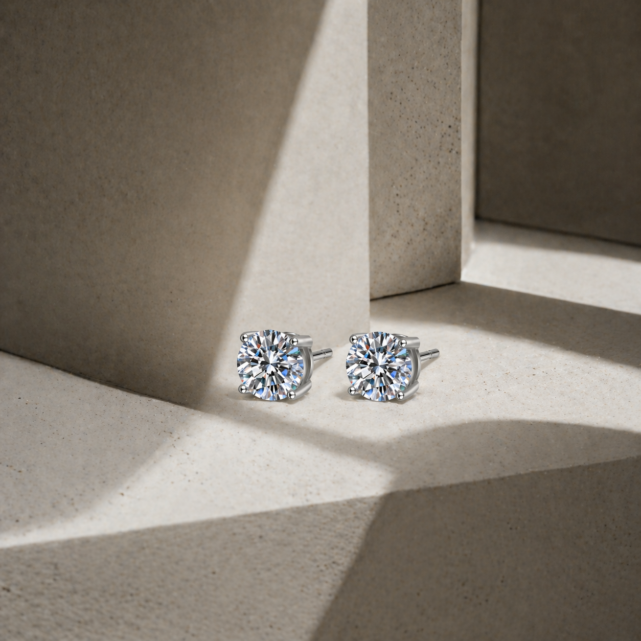 An Instant Classic Four-Prong Moissanite Stud Platinum Plated Earrings